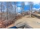 Expansive backyard with mature trees providing privacy at 6225 Leeward Tide Ct, Cumming, GA 30041