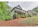 Charming two-story home with mature landscaping and a well-maintained front yard at 6225 Leeward Tide Ct, Cumming, GA 30041