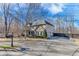 Charming two-story home with a long driveway and lush landscaping at 6225 Leeward Tide Ct, Cumming, GA 30041