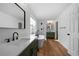 Stylish bathroom with a soaking tub, walk-in shower, and a vanity with double sinks at 780 Gardenside Se Cir, Marietta, GA 30067