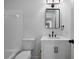 A bathroom with a white vanity, mirror and tile in the shower at 780 Gardenside Se Cir, Marietta, GA 30067