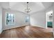 A bright bedroom features hardwood floors, two large windows and neutral paint at 780 Gardenside Se Cir, Marietta, GA 30067