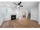 Bright living room with a fireplace and hardwood floors, creating a cozy and inviting atmosphere at 780 Gardenside Se Cir, Marietta, GA 30067