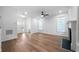 Spacious living room features hardwood floors, a fireplace, and large windows for ample natural light at 780 Gardenside Se Cir, Marietta, GA 30067