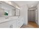 Modern bathroom features double sink vanity and sleek hardware at 878 Forrester Cemetery Rd, Covington, GA 30014