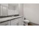 Bathroom featuring white vanity with marble countertop and brushed nickel faucet at 878 Forrester Cemetery Rd, Covington, GA 30014