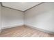 Empty bedroom with hardwood floors and grey trim at 878 Forrester Cemetery Rd, Covington, GA 30014