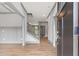 View of the foyer featuring wood flooring, staircase, and neutral wall colors at 878 Forrester Cemetery Rd, Covington, GA 30014