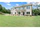 Beautiful two-story house with covered entry and expansive lawn at 878 Forrester Cemetery Rd, Covington, GA 30014