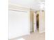 Bedroom featuring double closets with neutral walls and carpet, with a fan at 1807 Ashborough Cir # G, Marietta, GA 30067