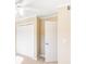 Bedroom featuring neutral carpet and walls, with a closet and doorway at 1807 Ashborough Cir # G, Marietta, GA 30067