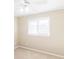 Bright bedroom with a window, neutral walls, carpet, and white trim at 1807 Ashborough Cir # G, Marietta, GA 30067