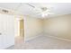 Inviting bedroom with carpet, ceiling fan, and natural light at 1807 Ashborough Cir # G, Marietta, GA 30067