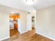 A dining room view of a bright kitchen and a laundry room at 1807 Ashborough Cir # G, Marietta, GA 30067