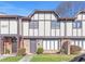 Charming townhome featuring a brick facade, well-maintained landscaping, and inviting curb appeal at 1807 Ashborough Cir # G, Marietta, GA 30067