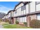 Attractive townhomes with a combination of brick and siding, showcasing a well-manicured lawn at 1807 Ashborough Cir # G, Marietta, GA 30067