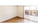 Living room with sliding glass doors to the patio and hardwood floors at 1807 Ashborough Cir # G, Marietta, GA 30067