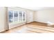 Sun-drenched living room featuring hardwood floors and a large front window at 1807 Ashborough Cir # G, Marietta, GA 30067
