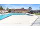 Inviting community pool with a well-kept deck and lounge chairs, perfect for summer relaxation at 1807 Ashborough Cir # G, Marietta, GA 30067