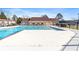 Inviting community pool with a well-kept deck and lounge chairs, perfect for summer relaxation at 1807 Ashborough Cir # G, Marietta, GA 30067