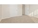 Bedroom with neutral paint, plush carpet, and a closet at 621 Shadow Lake Dr, Lithonia, GA 30058
