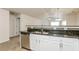 Modern kitchen with stainless steel appliances and granite countertops at 621 Shadow Lake Dr, Lithonia, GA 30058