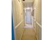 Cozy hallway with neutral carpeting and decorative wallpaper at 1959 Firelight Ln, Buford, GA 30519