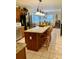 Spacious kitchen island featuring a granite countertop and seating for three at 1959 Firelight Ln, Buford, GA 30519