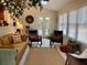 Relaxing sunroom with comfortable seating, skylight, and natural light at 1959 Firelight Ln, Buford, GA 30519