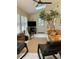 Bright sunroom with neutral colors, and comfortable seating perfect for relaxation at 1959 Firelight Ln, Buford, GA 30519