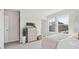 Serene bedroom showcasing natural light, a dresser, and a closet door at 125 Silvia Ln # 24, Hapeville, GA 30354