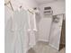 Walk-in closet with organized shelving and a full-length mirror at 125 Silvia Ln # 24, Hapeville, GA 30354