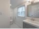 Bright bathroom with a modern vanity, toilet, and mirror, providing a clean and functional space at 500 Pomona Sw Cir, Atlanta, GA 30315