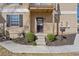 Inviting front entrance with landscaped garden beds and sidewalk at 1391 Old Coach Sw Rd, Marietta, GA 30008