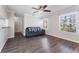 Cozy living room with hardwood floors, modern paint, and bright windows at 1391 Old Coach Sw Rd, Marietta, GA 30008