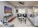 Stylish living room featuring a ceiling fan, modern decor, and a comfortable seating arrangement at 221 Cobb St, Palmetto, GA 30268