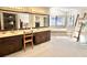 Spacious bathroom featuring double sinks, a soaking tub, and ample counter space at 3150 Bolero Dr, Atlanta, GA 30341