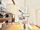 Elegant dining room showcasing an ornate chandelier and an open floor plan at 3150 Bolero Dr, Atlanta, GA 30341