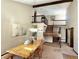Inviting dining area boasting high ceilings, a wooden table and a staircase at 3150 Bolero Dr, Atlanta, GA 30341