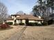 Charming single-story home featuring manicured landscaping and a welcoming entrance at 3150 Bolero Dr, Atlanta, GA 30341