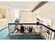 View of the upstairs hallway from a balcony overlooking the downstairs at 3150 Bolero Dr, Atlanta, GA 30341