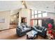 Spacious living room featuring vaulted ceilings, large windows, and comfortable seating at 3150 Bolero Dr, Atlanta, GA 30341