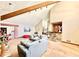 Bright living room with vaulted ceiling, stone bar, and comfortable sofas at 3150 Bolero Dr, Atlanta, GA 30341