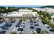 An aerial view of a shopping center parking lot with many cars at 1235 Seale Dr, Alpharetta, GA 30022