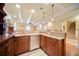 Basement bar featuring a stainless steel mini fridge and granite countertops at 210 Lawn Market, Sharpsburg, GA 30277