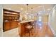 Finished basement with a custom bar, granite countertops, and a ping pong table at 210 Lawn Market, Sharpsburg, GA 30277