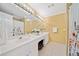 Bright bathroom featuring double sinks and a large mirror at 210 Lawn Market, Sharpsburg, GA 30277