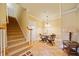 Dining nook with a small table and chairs, tile floors and access to stairs at 210 Lawn Market, Sharpsburg, GA 30277
