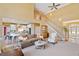 Inviting living room featuring a staircase, fireplace, and modern decor at 210 Lawn Market, Sharpsburg, GA 30277