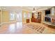 Open concept living area with french doors, fireplace, and tile floors at 210 Lawn Market, Sharpsburg, GA 30277